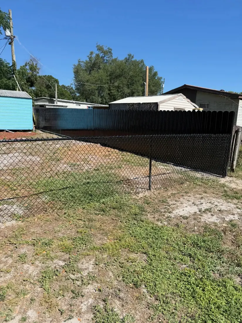 White vinyl fence and gate installation