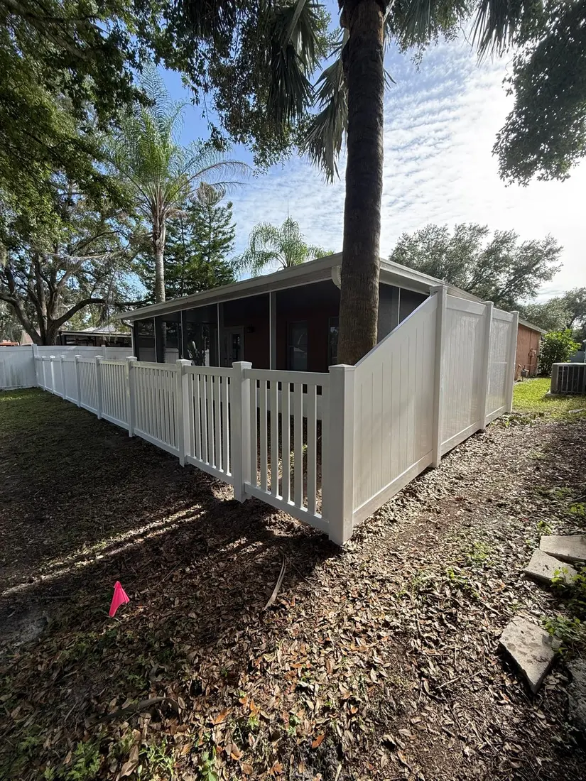 White vinyl fence and gate installation