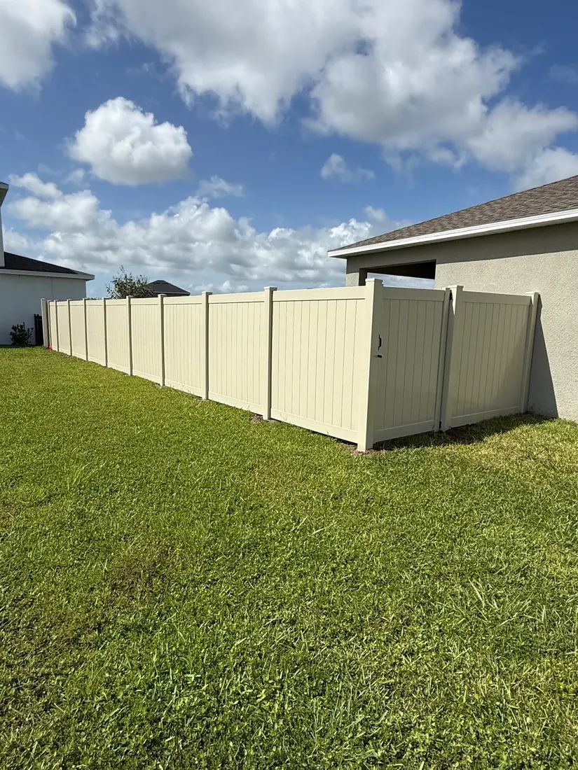 White vinyl fence installation, finished job